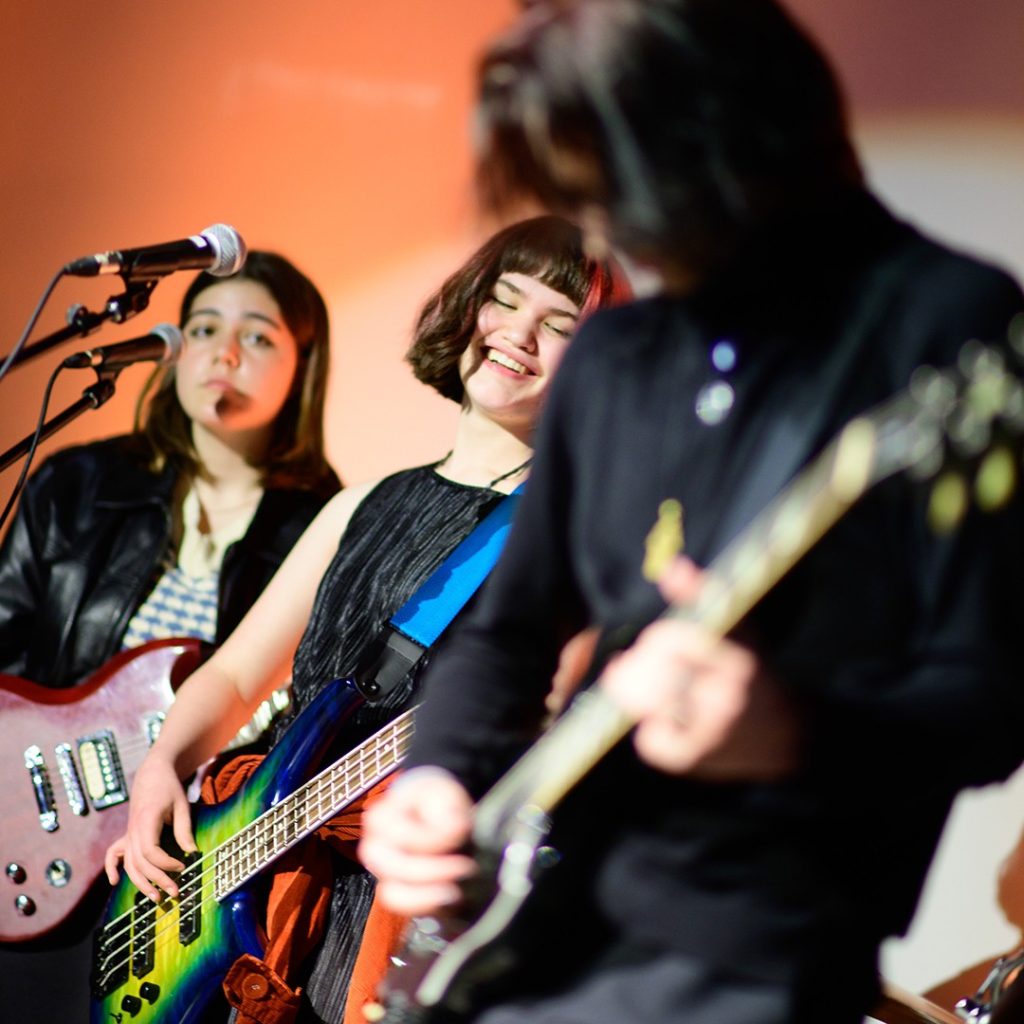 Members of Stage Fright band playing at the Spy Hop 2022 Annual Benefit.